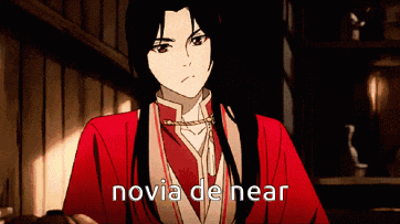 a man in a red kimono says " novia de near "