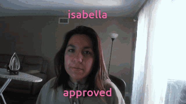 a woman in a living room with the name isabella above her