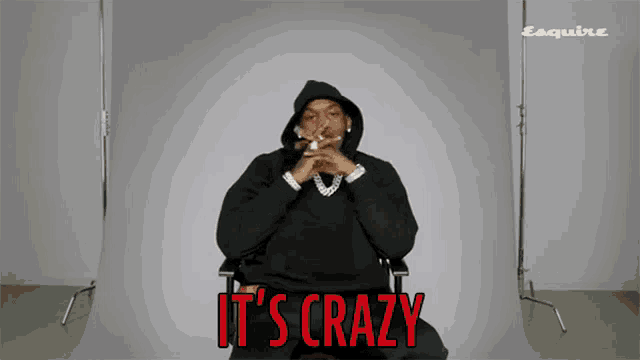a man in a black hoodie says it 's crazy in red
