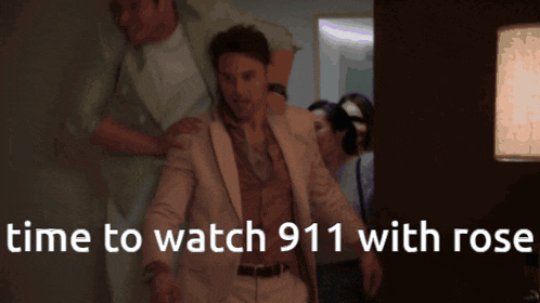 a man in a suit is being escorted by a nurse with the words time to watch 911 with rose above him