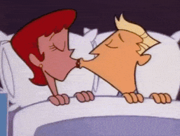 a cartoon of a man and woman kissing in bed .