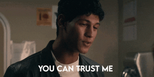 a man in a leather jacket is saying you can trust me .