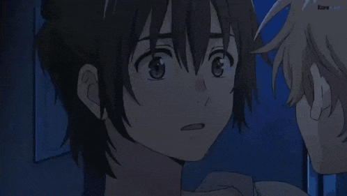 a couple of anime characters are kissing with the word kuro on the bottom