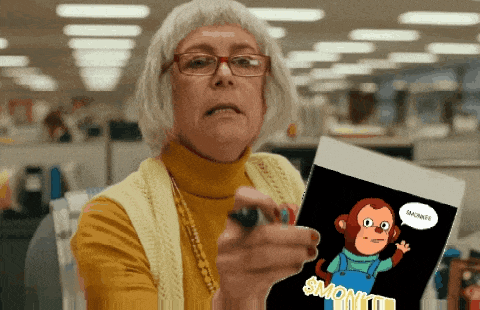 a woman is holding a piece of paper that says simon