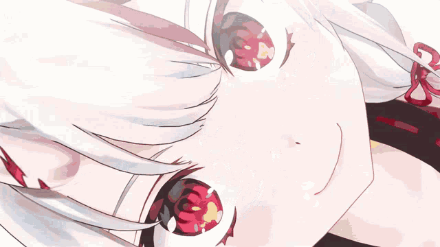 a girl with white hair and red eyes is laying down