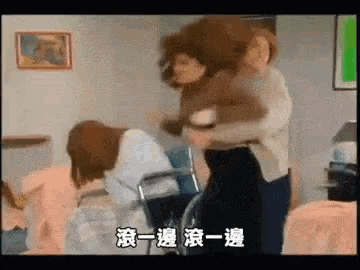 a woman in a wheelchair is being pushed by another woman