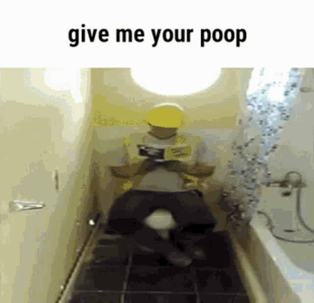 a man in a yellow hard hat is sitting on a toilet in a bathroom .