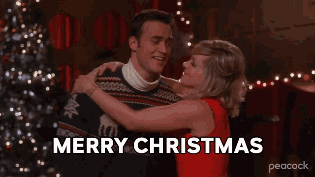 a man and woman are hugging with the words merry christmas written in black