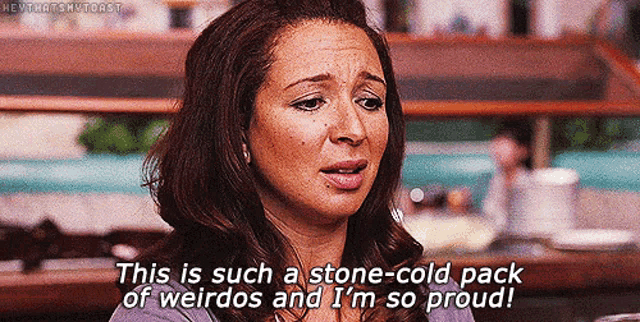 a woman is saying " this is such a stone-cold pack of weirdos and i 'm so proud "