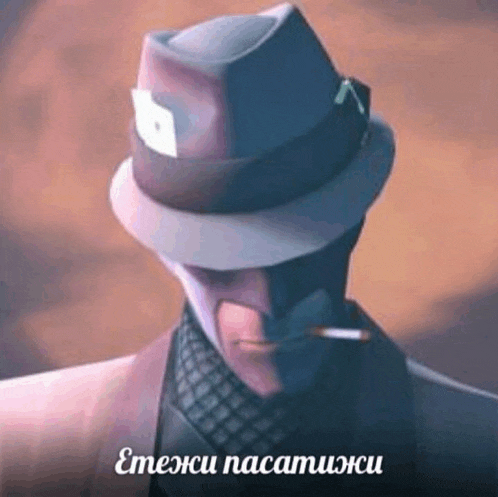 a man in a suit and hat is smoking a cigarette and has a foreign language on his face .
