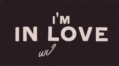 a sign that says i 'm in love with you on it
