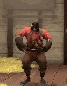 a man wearing a gas mask is standing on a wooden floor .