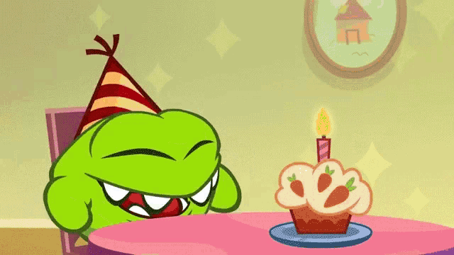 a cartoon character wearing a party hat sits at a table with a gift box on it