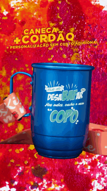 a blue mug that says desa bafar copo
