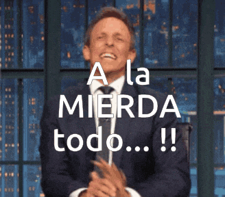 a man in a suit and tie is clapping with the words a la mierda todo written above him