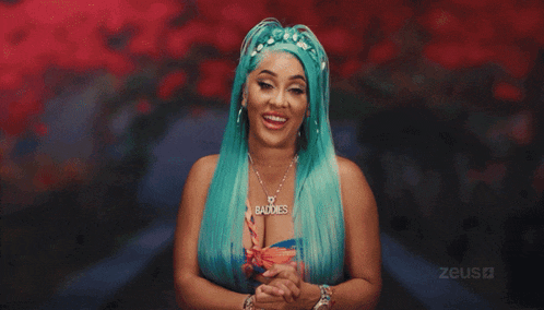 a woman with blue hair and a baddies necklace