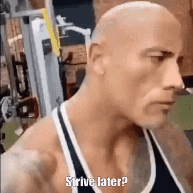 a bald man in a tank top is saying " strive later ? " in a gym .