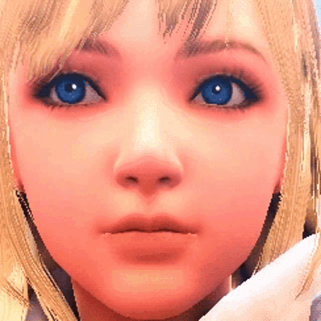 a close up of a woman 's face with blue eyes and blonde hair
