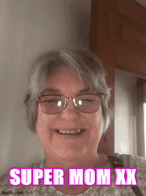 a woman wearing glasses and smiling with the words super mom xx below her