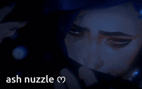 a blue background with the words ash nuzzle