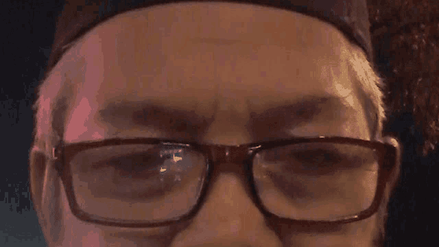 a close up of a person 's face with the words lebai bodoh written above it