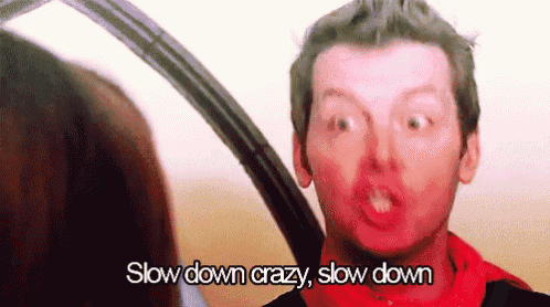 a man is making a funny face and saying slow down crazy slow down