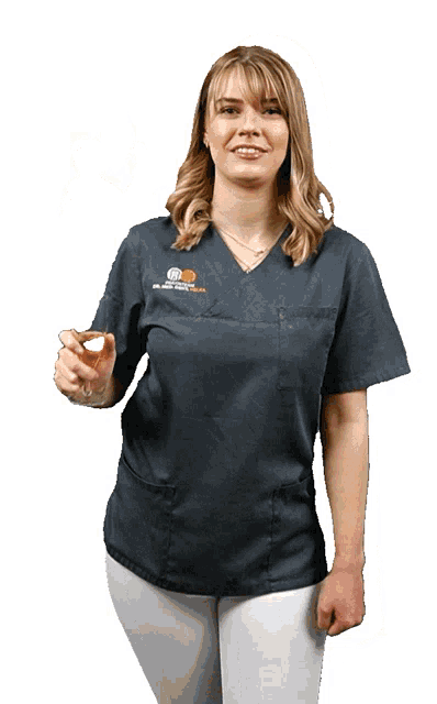 a woman wearing a scrub top that says dr. astrid schulz