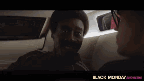 a black monday showtime ad shows a man in a car