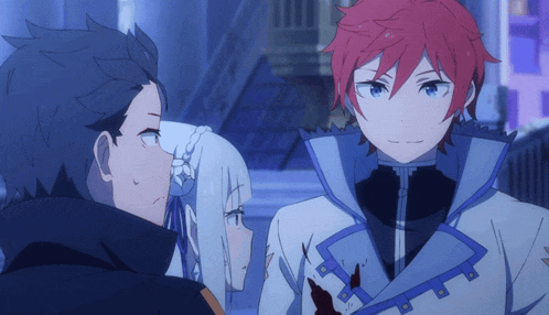 a man with red hair and blue eyes is standing next to a woman