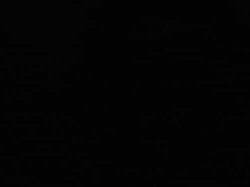 a black background with a few white dots on it .