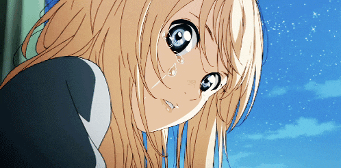 a girl with long blonde hair is crying with tears coming out of her eyes