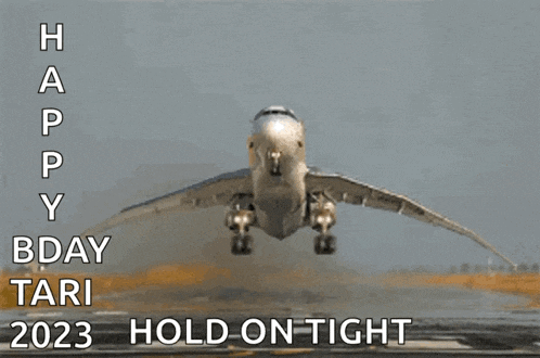 an airplane is taking off with the words happy bday tari 2023 hold on tight