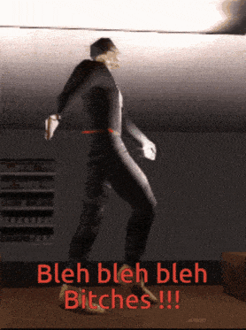 a man is dancing in a dark room with the words bleh bleh bleh bitches