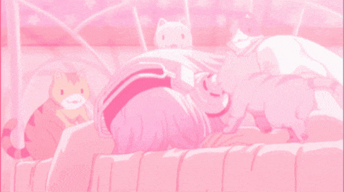a girl is laying on a bed with a pink background