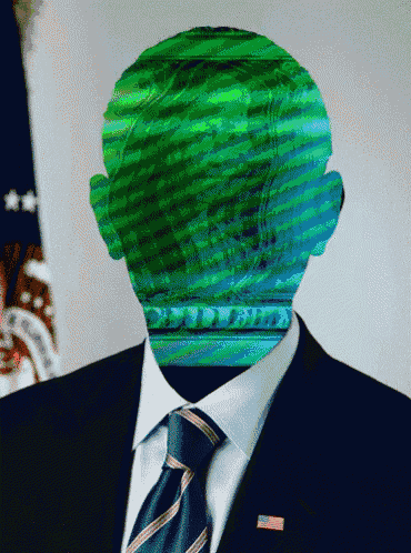 a man in a suit and tie has a green glowing head