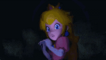 a close up of a cartoon character , peach , with blue eyes .