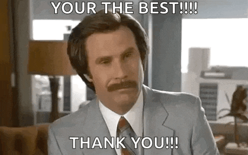 a man in a suit and tie is sitting in a chair and saying `` your the best !!! thank you !!! '' .