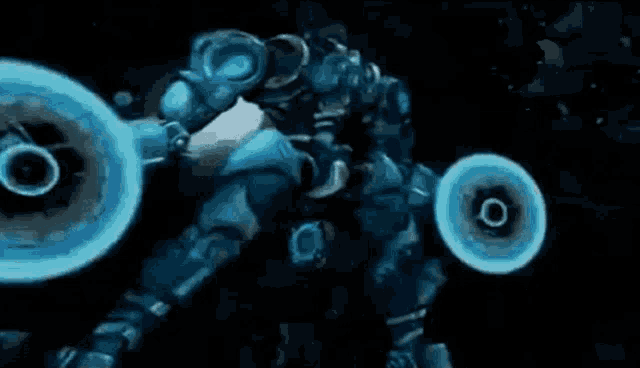 a robot is standing in a dark room with two blue circles around it 's arms .