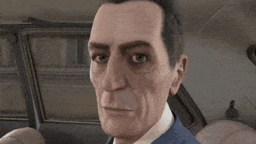 a close up of a man 's face in a car