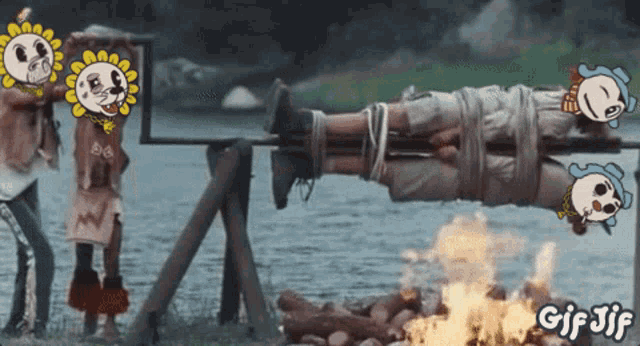 a gif of a man being tortured by a group of people