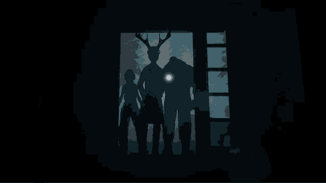 a group of people standing in a dark room with shadows on the floor