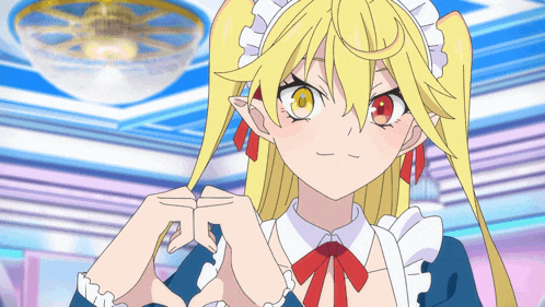 a girl with yellow hair and red eyes is making a heart with her hands