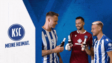 three soccer players are holding bottles of beer in front of a ksc logo