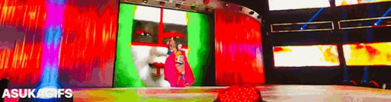 a colorful stage with a sign that says asukagifs on it