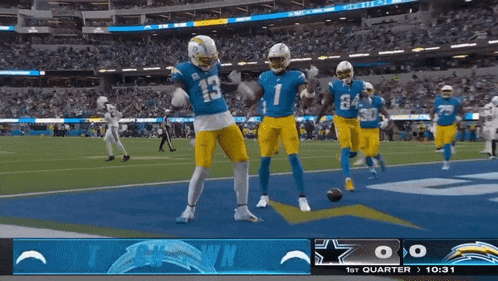 a football game is being played in a stadium with a score of 0 to 0