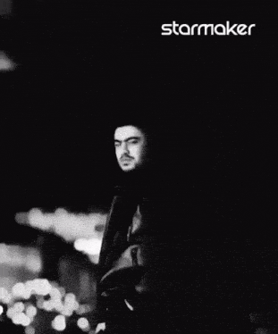 a black and white photo of a man in a leather jacket with the word starmaker on the bottom