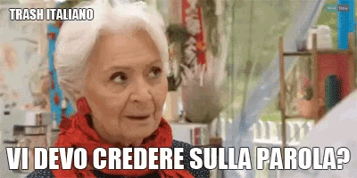 an elderly woman with a red scarf around her neck says trash italiano vi devo credere sulla parola