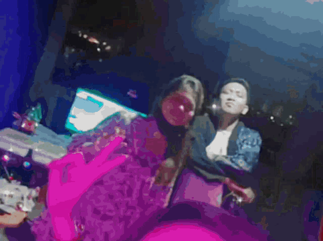 a blurry picture of a woman taking a selfie