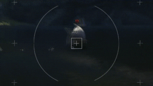 a picture of a fish in the water with a circle around it with a plus sign in the middle