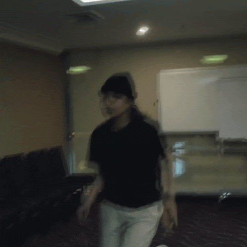 a blurry picture of a person in a black shirt